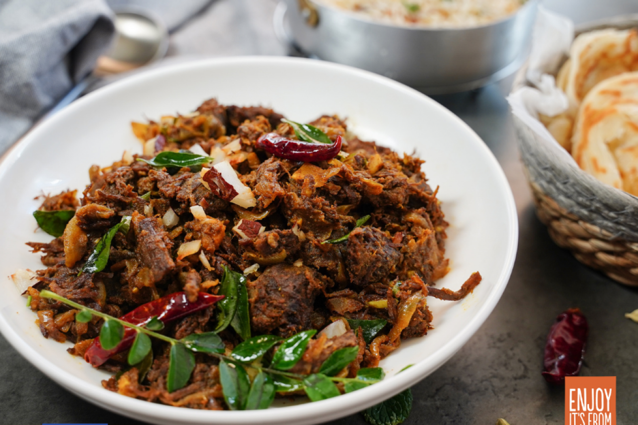 Kerala Parotta with Chicken Curry with European Corinthian black raisins 